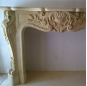Beige marble fireplace